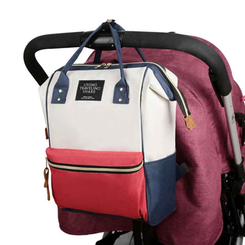Sac a langer Nomadbag accroché poussette